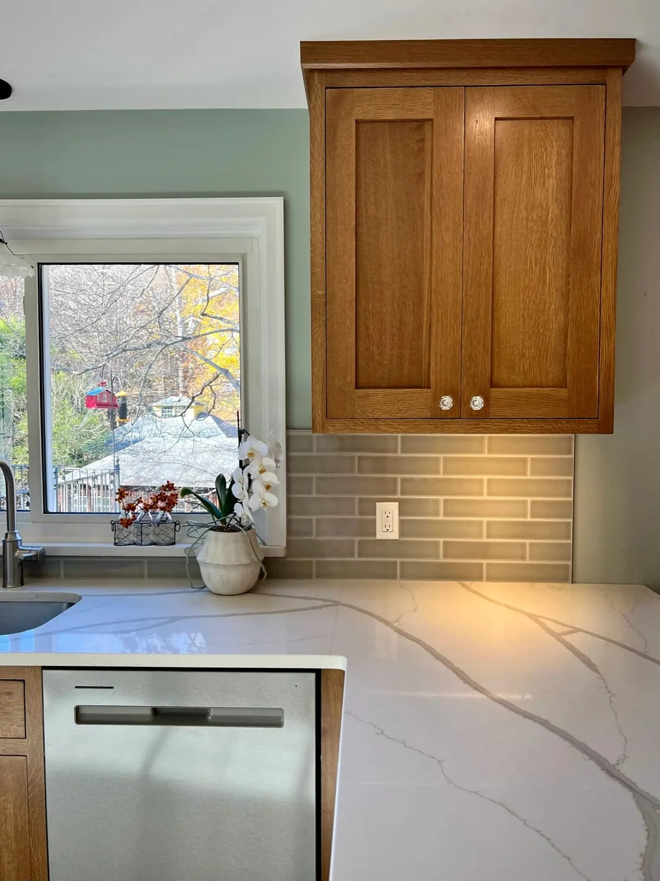 White oak sink wall with window and grey subway tile in Deep River CT