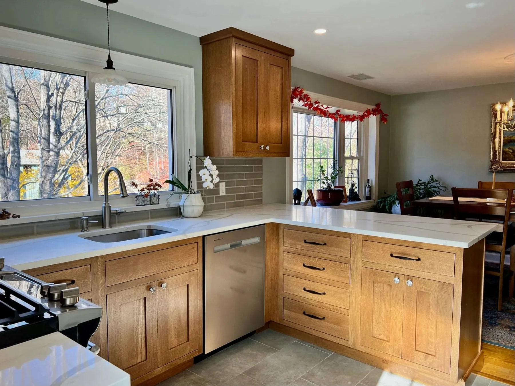 Quarter-sawn white oak inset kitchen in Deep River CT with white quartz counters and grey tile backsplash