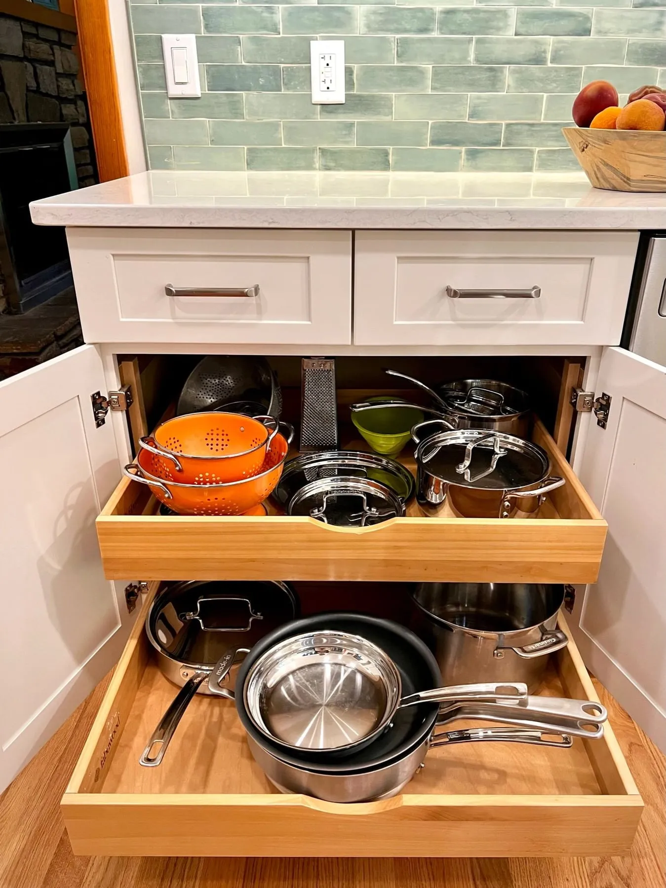 Roll-out drawers inside a base cabinet in a Guilford CT kitchen