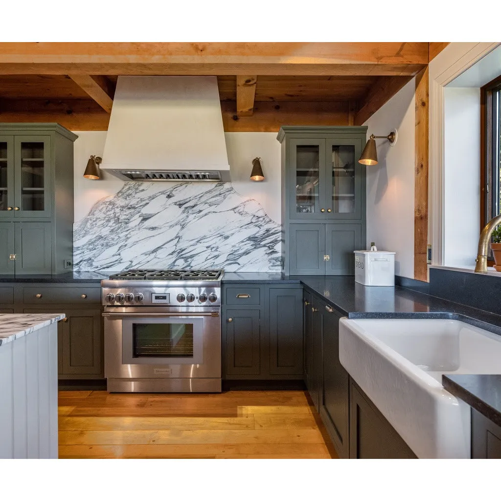 Rustic U-shaped kitchen in Old Saybrook CT with green cabinets, granite counters and two islands